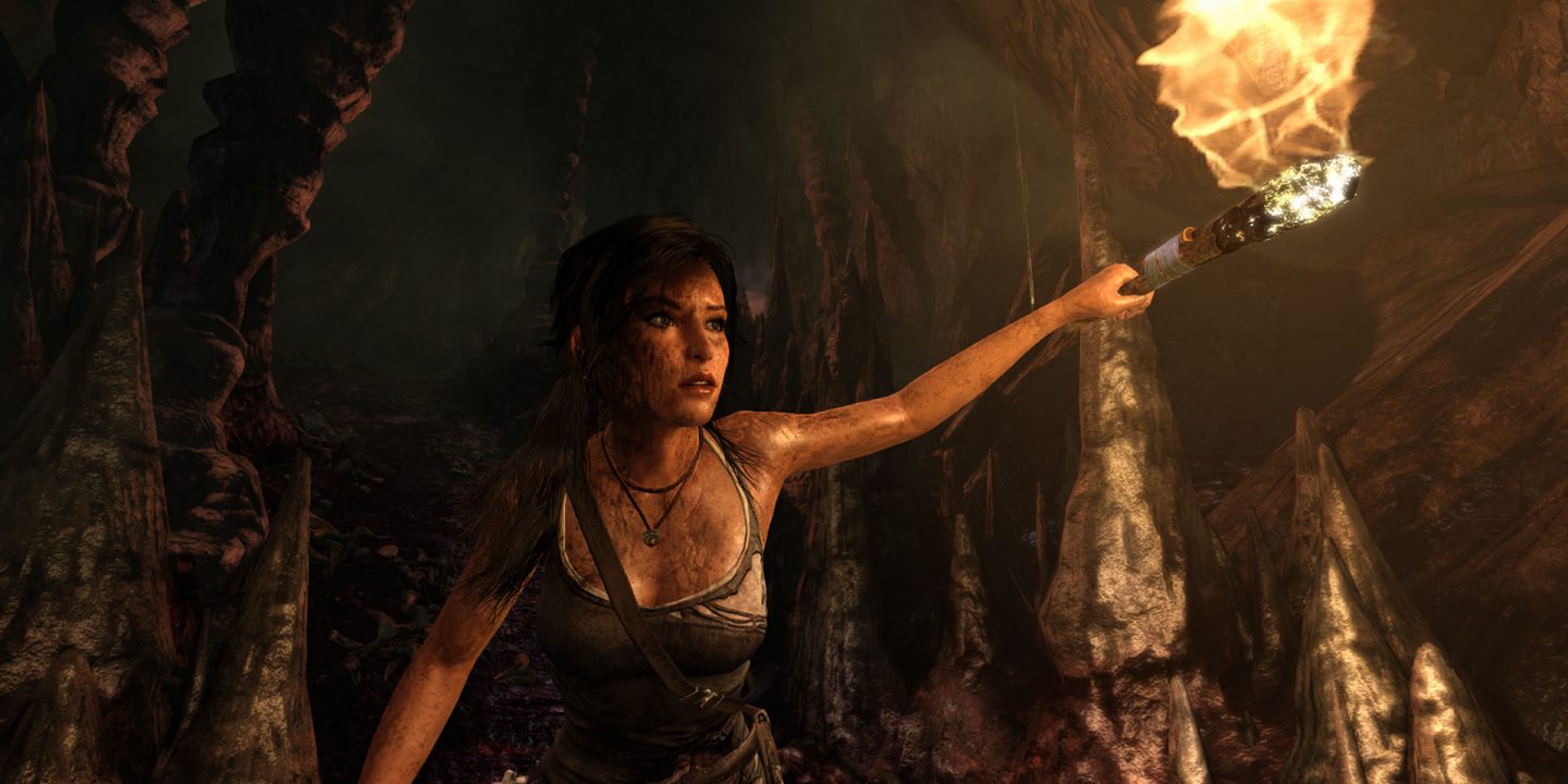 Lara Croft explores a cave.